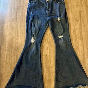 Distressed Flare Jeans in Dark Blue